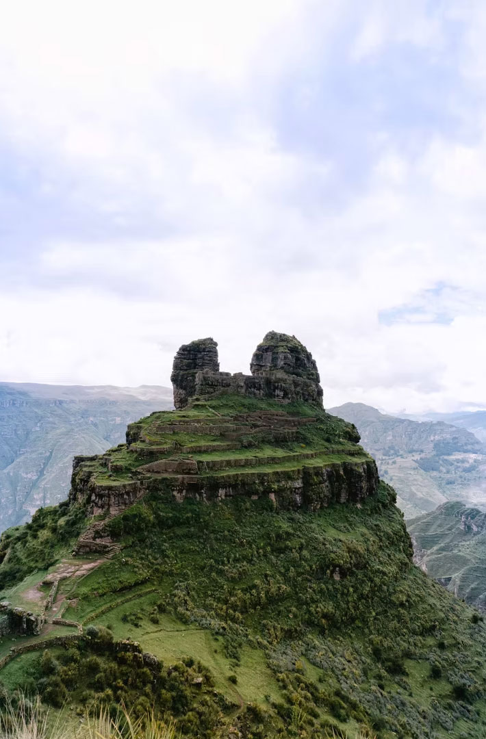 Sacred rock formation at Waqrapukara Inca site in southern Peru