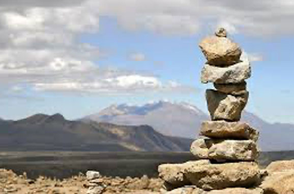 Traditional Andean apacheta stone stack in the Ausangate highlands